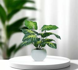 Lush Green Artificial Foliage Plant with White Ribbed Pot